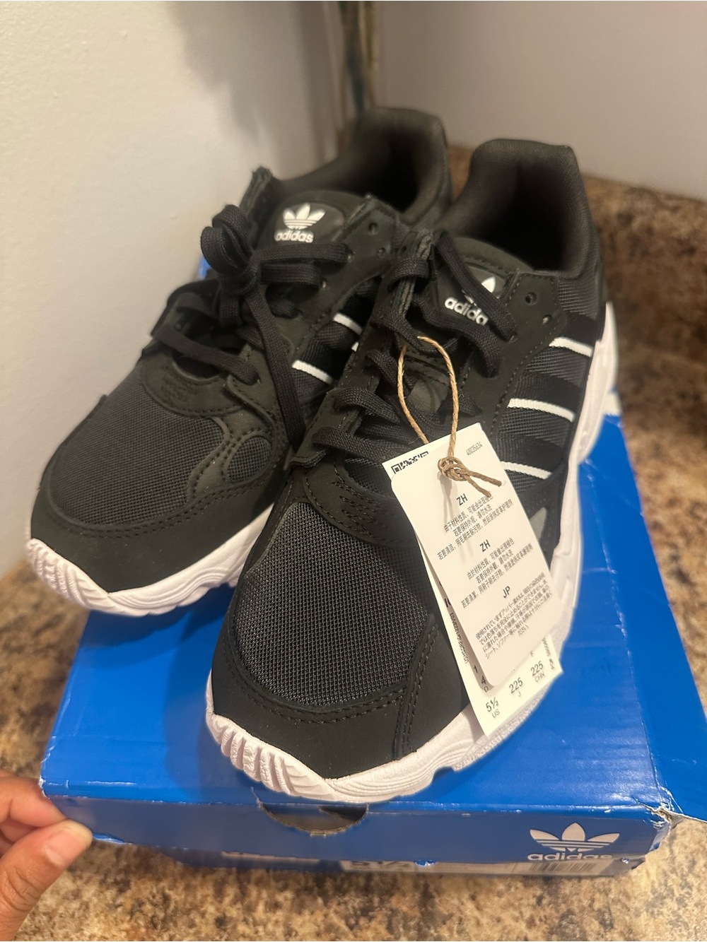 adidas women’s Black and White Athletic Sneakers